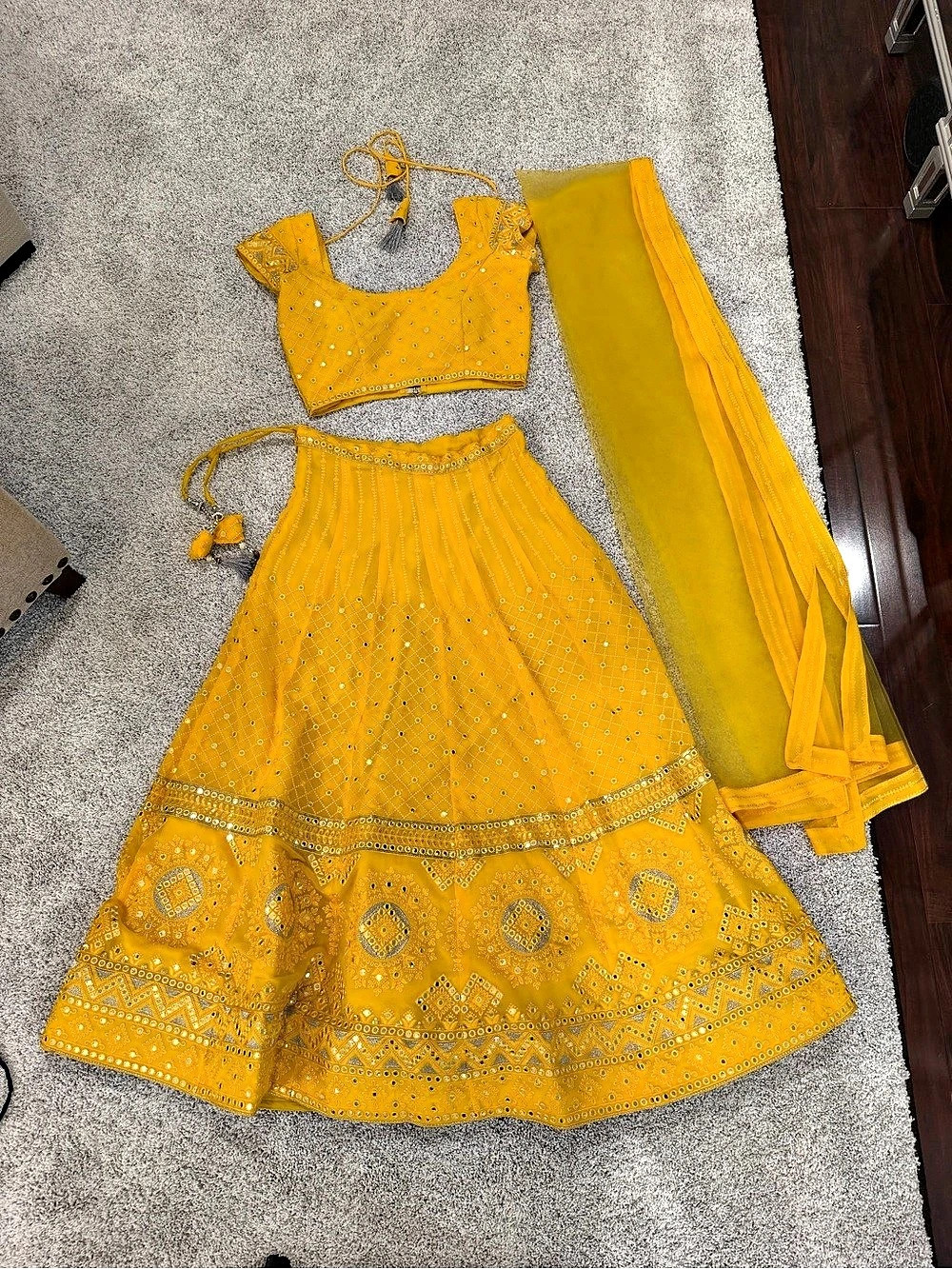 Yellow embroidered lehenga choli with dupatta stunning